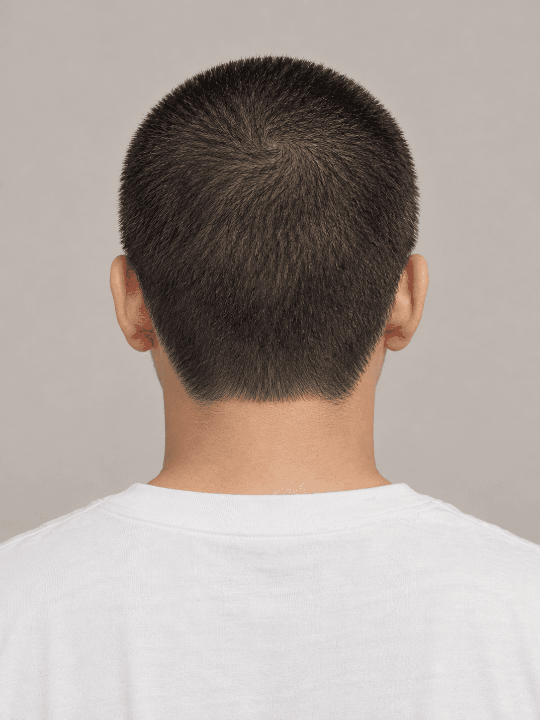Buzz Cut on a man with straight black hair, back view