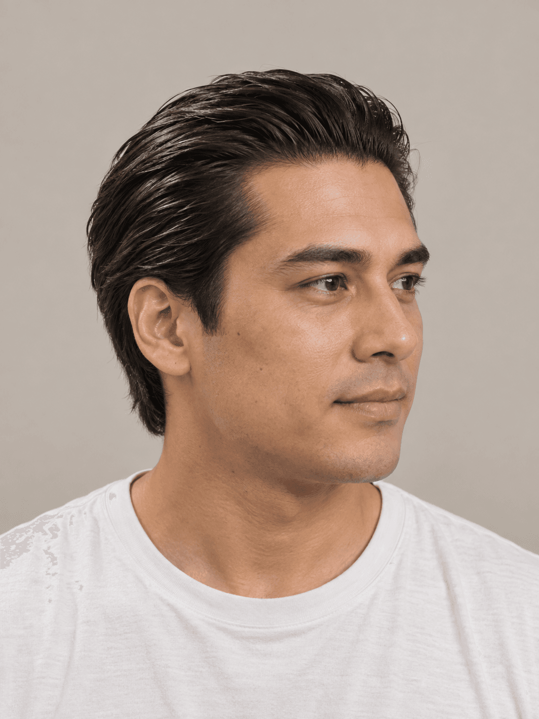Vampire Slick-Back on a man with light tan skin and black hair, three-quarter view